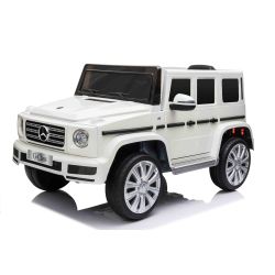 Električni avtomobilček Mercedes G500 12V, bel, 2,4 GHz daljinski upravljalnik, USB/SD vhod, vzmetenje, litijeva baterija, LED luči, ORIGINALNA registracija